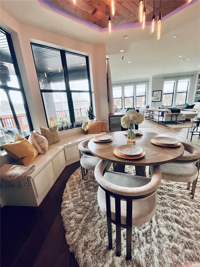 dining area with visible vents, wood finished floors, and recessed lighting