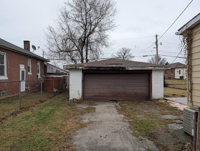 detached garage with central AC and fence