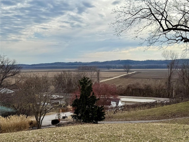 view of mountain feature with a rural view