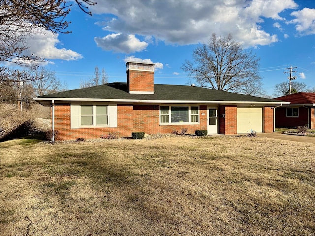 rear view of house with roof with shingles, a yard, concrete driveway, a garage, and brick siding