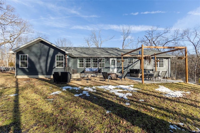 back of property featuring a patio