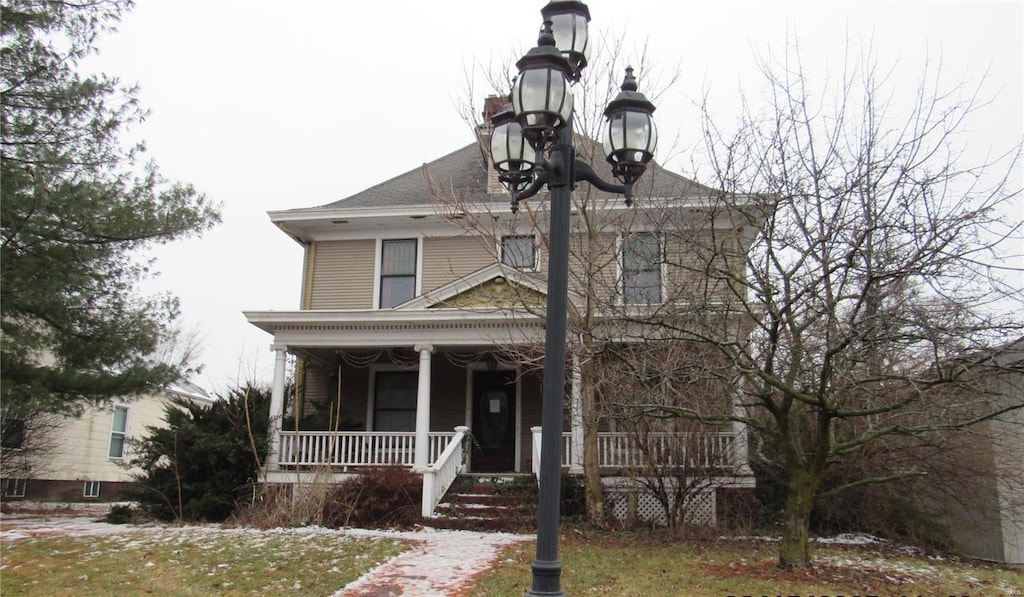 traditional style home with covered porch