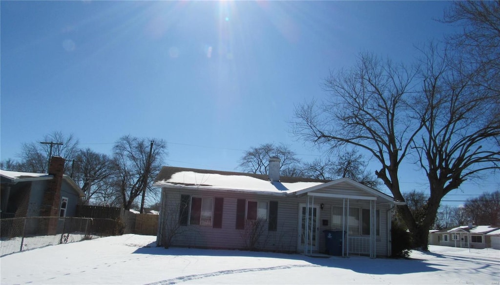 view of front of property with fence