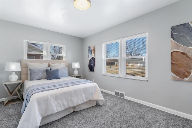 bedroom featuring carpet, visible vents, and baseboards