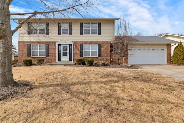 colonial house featuring a front yard, brick siding, driveway, and an attached garage