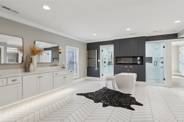 bathroom with visible vents, ornamental molding, a shower stall, and tile patterned flooring