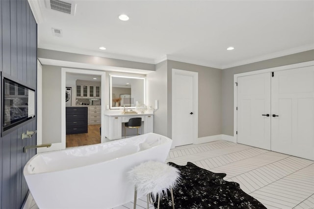 interior space featuring visible vents, light tile patterned flooring, recessed lighting, a closet, and crown molding