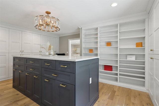 interior space featuring a notable chandelier and light wood finished floors