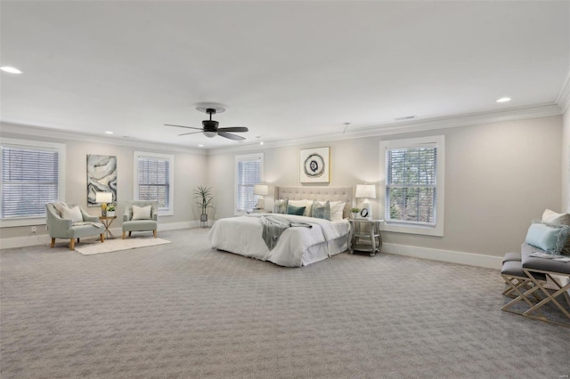 carpeted bedroom with recessed lighting, ceiling fan, baseboards, and ornamental molding