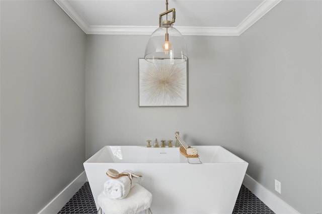 full bath featuring a soaking tub, baseboards, and ornamental molding