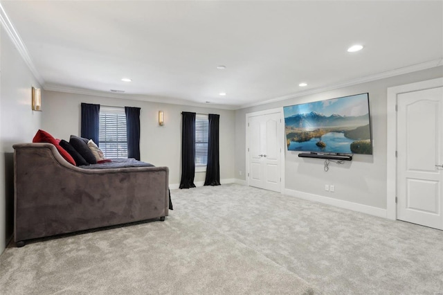 living area with crown molding, baseboards, and carpet floors