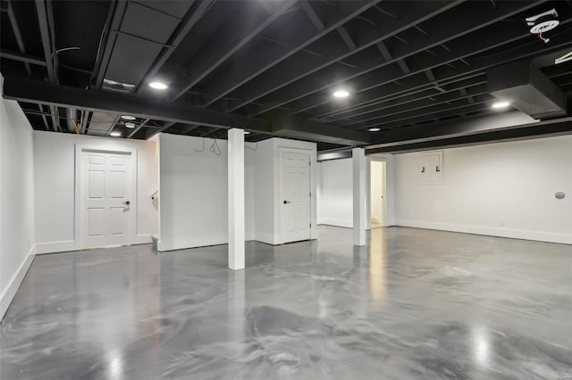 finished basement featuring baseboards