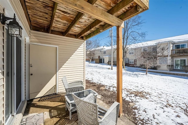 view of snow covered patio