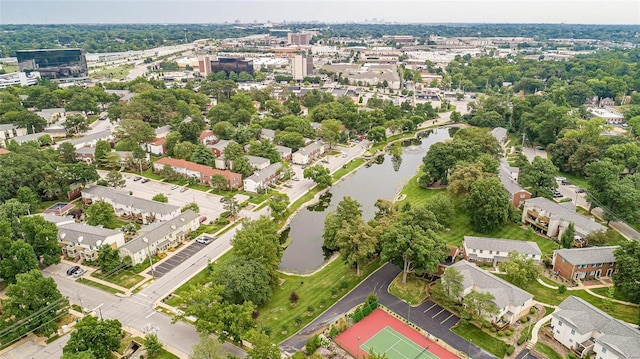 bird's eye view with a water view and a residential view