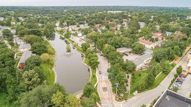 bird's eye view with a water view and a residential view