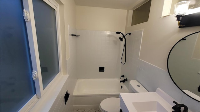 full bathroom with  shower combination, vanity, and toilet