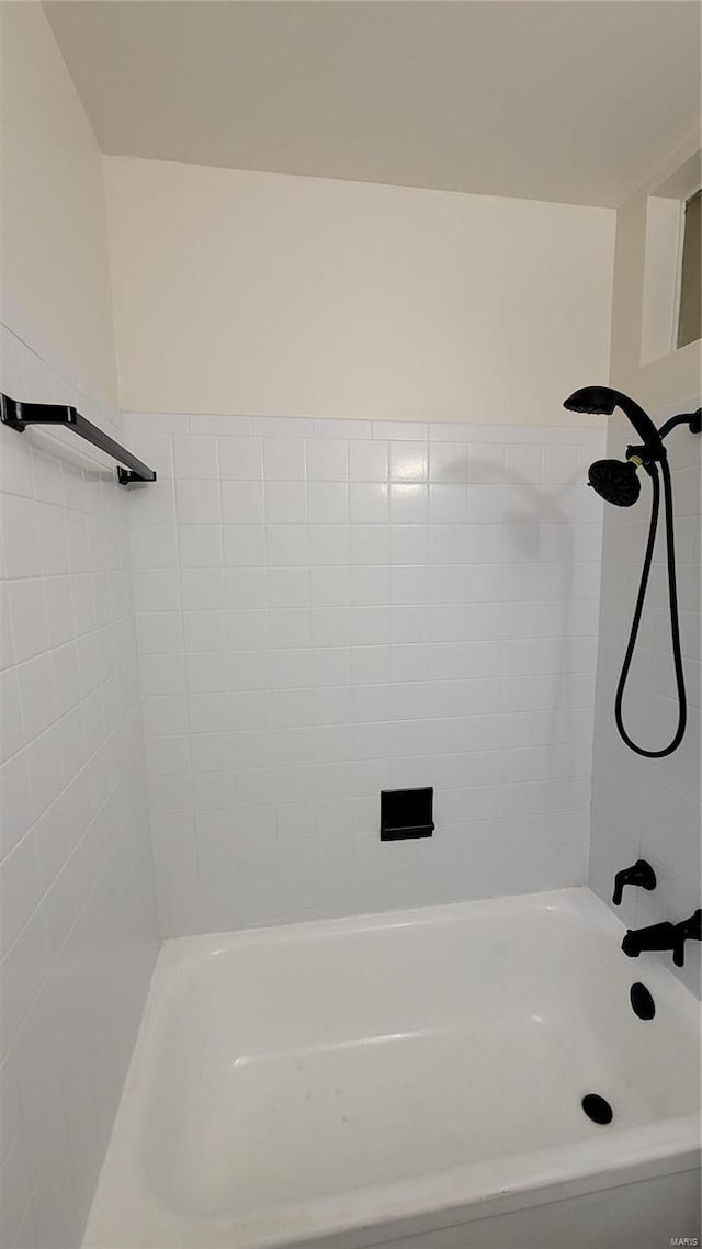 bathroom with shower / bath combination