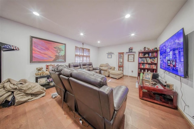 living room featuring wood finished floors and recessed lighting