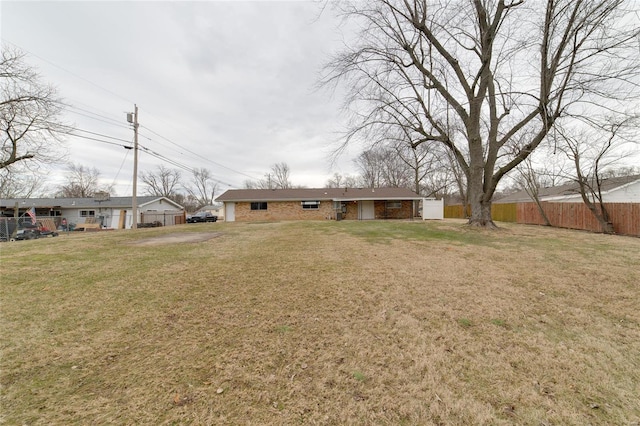 view of yard with fence