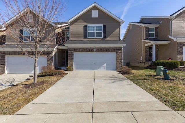 view of front of house featuring concrete driveway, brick siding, and an attached garage