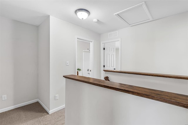 bar with light colored carpet, visible vents, and baseboards