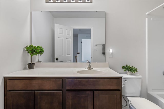 full bath with toilet, tub / shower combination, and vanity