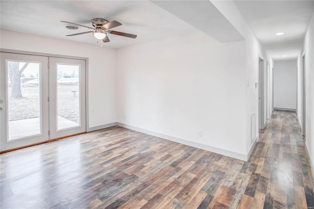 unfurnished room with a ceiling fan, baseboards, wood finished floors, and recessed lighting