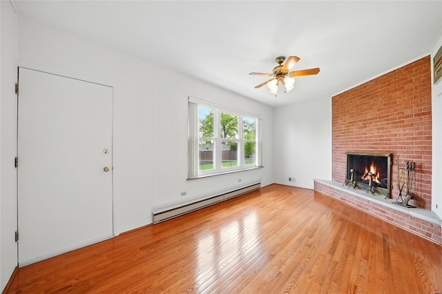 unfurnished living room with a baseboard radiator, ceiling fan, wood finished floors, and a fireplace
