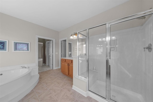 full bathroom with baseboards, a stall shower, vanity, and a bath