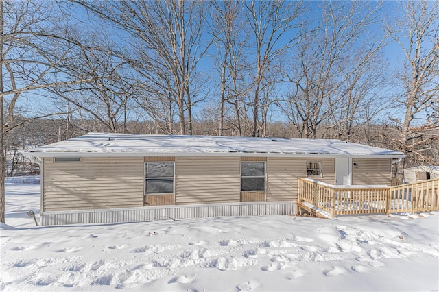 view of front of house featuring a wooden deck