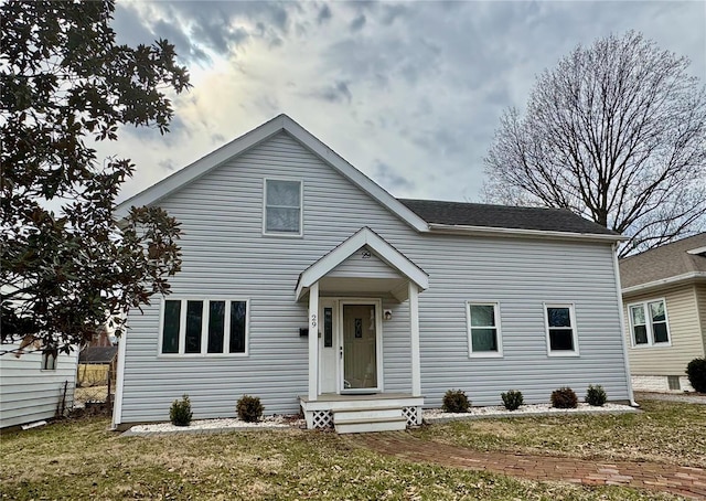 view of front of home featuring a front lawn