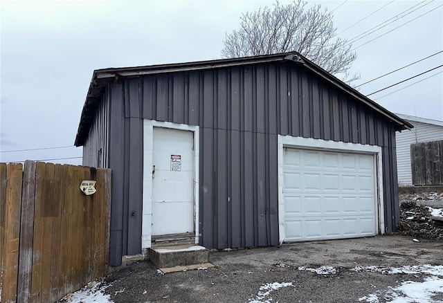 detached garage with fence