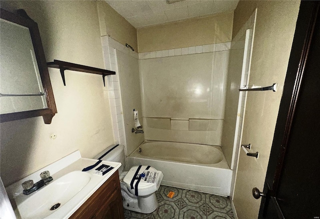 bathroom with shower / bathing tub combination, vanity, and toilet