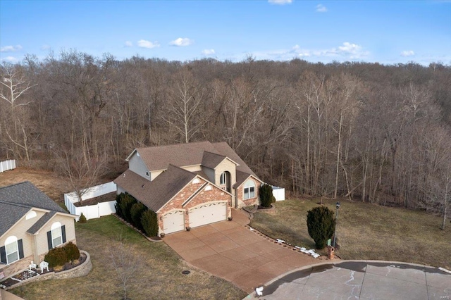 bird's eye view featuring a forest view