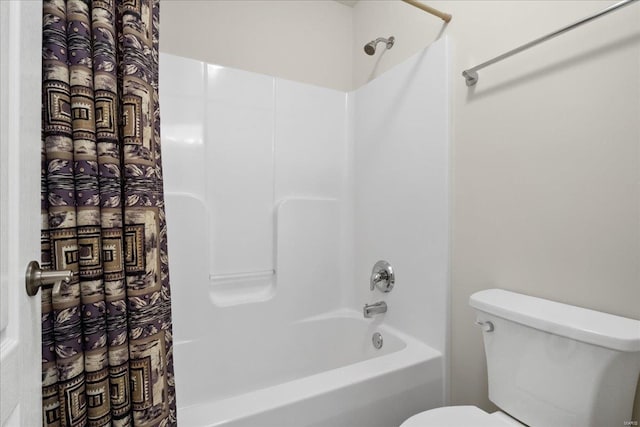 full bath with washtub / shower combination and toilet