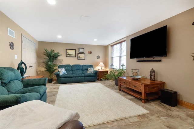 living room with visible vents and recessed lighting