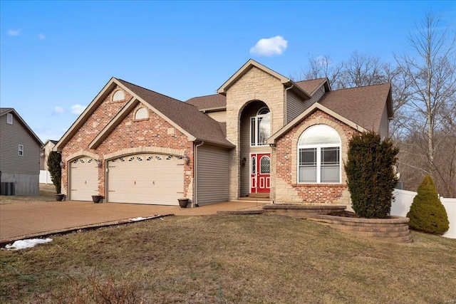 traditional-style home with an attached garage, brick siding, concrete driveway, roof with shingles, and a front yard