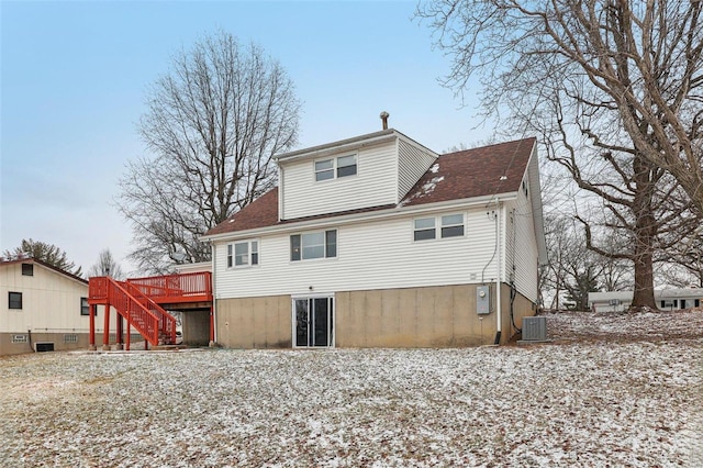 rear view of house with stairway, a wooden deck, and central air condition unit