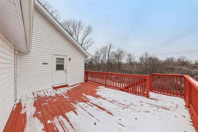 view of snow covered deck