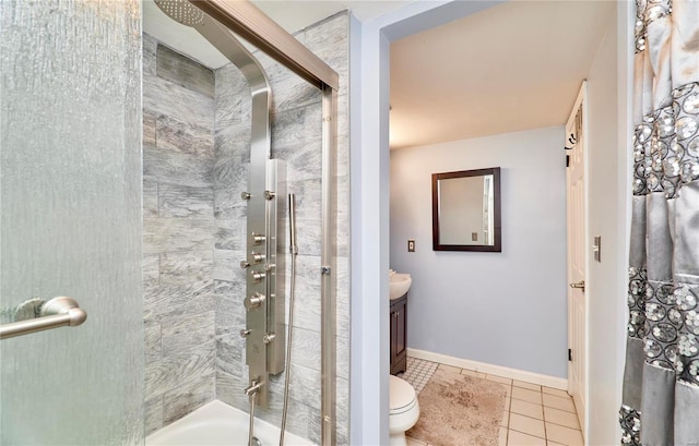 bathroom with tile patterned flooring, a shower with door, vanity, and toilet