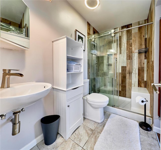 full bathroom featuring a stall shower and toilet