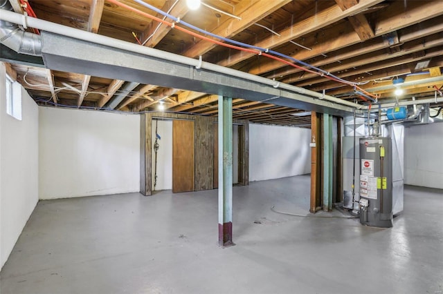 below grade area featuring gas water heater