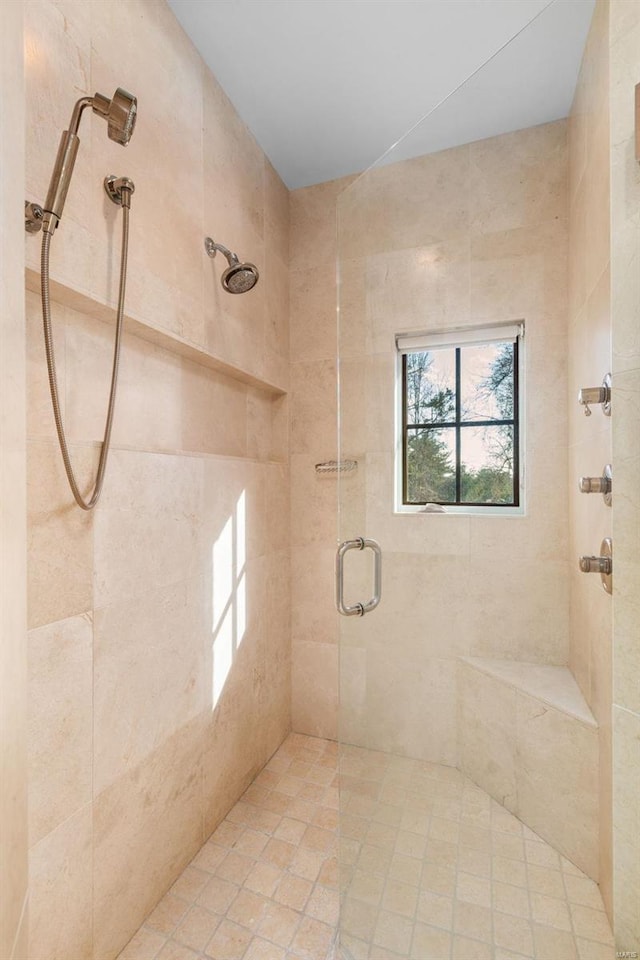 full bathroom featuring a shower stall