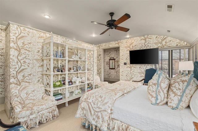 carpeted bedroom with visible vents, a ceiling fan, recessed lighting, wallpapered walls, and vaulted ceiling