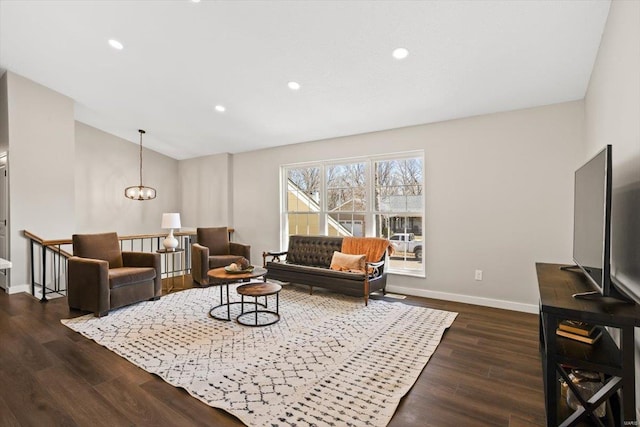 living room featuring dark wood-style floors, recessed lighting, vaulted ceiling, and baseboards