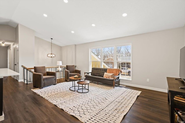 living room featuring vaulted ceiling, dark wood-type flooring, recessed lighting, and baseboards