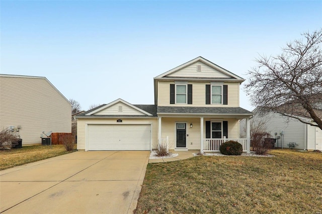 traditional-style home featuring a garage, driveway, a porch, and a front lawn