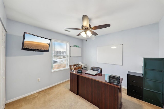 office with light colored carpet, visible vents, and baseboards