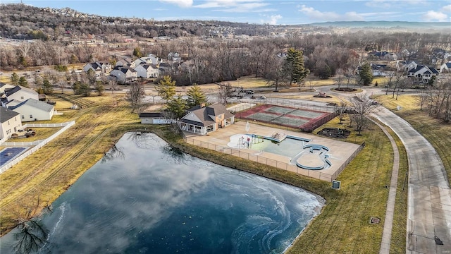 aerial view featuring a water view and a residential view