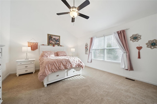 bedroom featuring baseboards, visible vents, vaulted ceiling, and light colored carpet